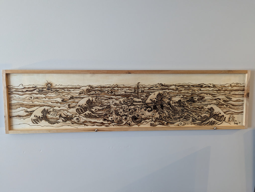 Hand drawn and wood burned artwork of the Edmund Fitzgerald