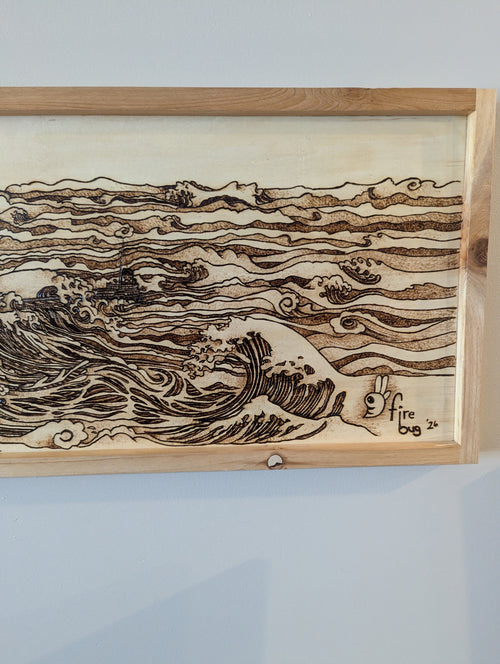 Hand drawn and wood burned artwork of the Edmund Fitzgerald