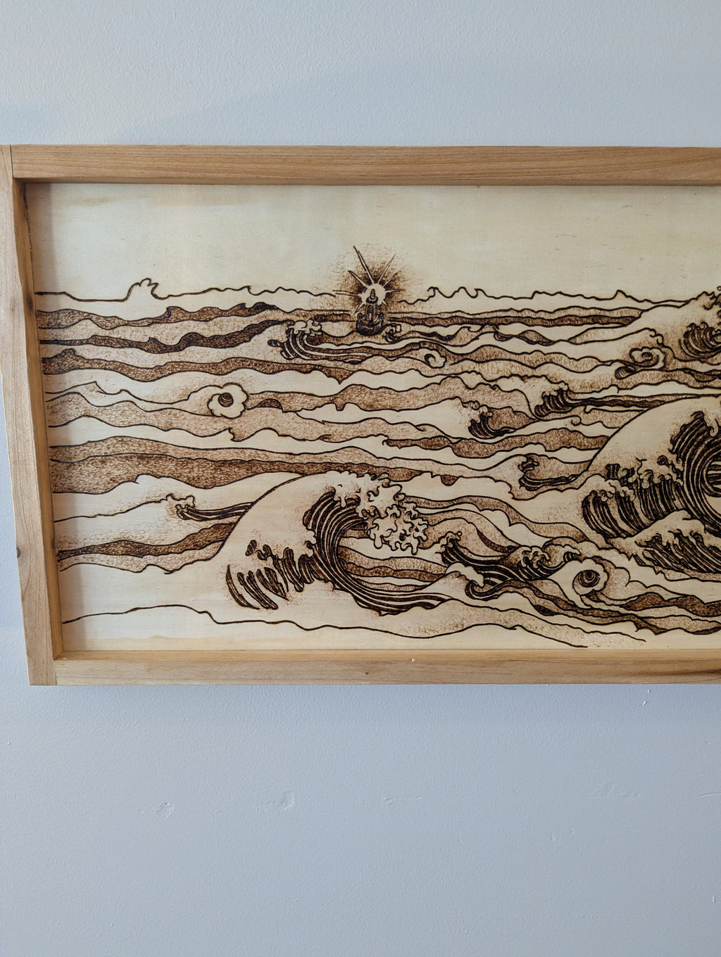 Hand drawn and wood burned artwork of the Edmund Fitzgerald