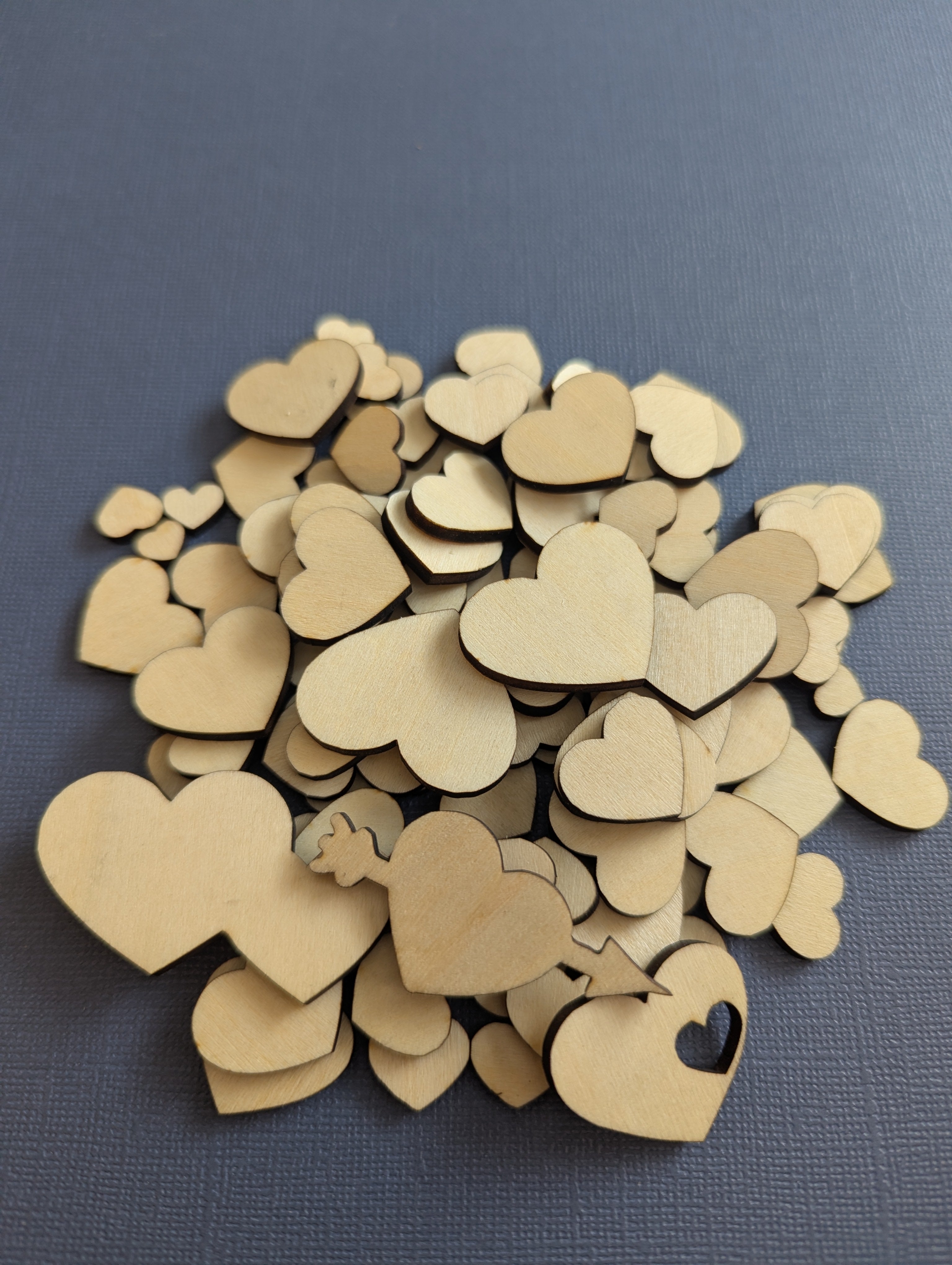 Set of 100 small laser cut hearts